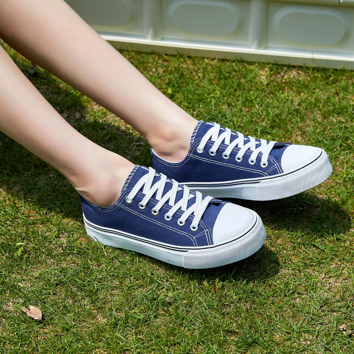 ZGR Padded Toe Low Top Canvas Sneaker in Navy, worn